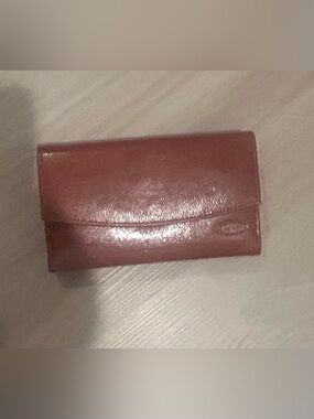 Rolfs brown leather card case with gold detail
